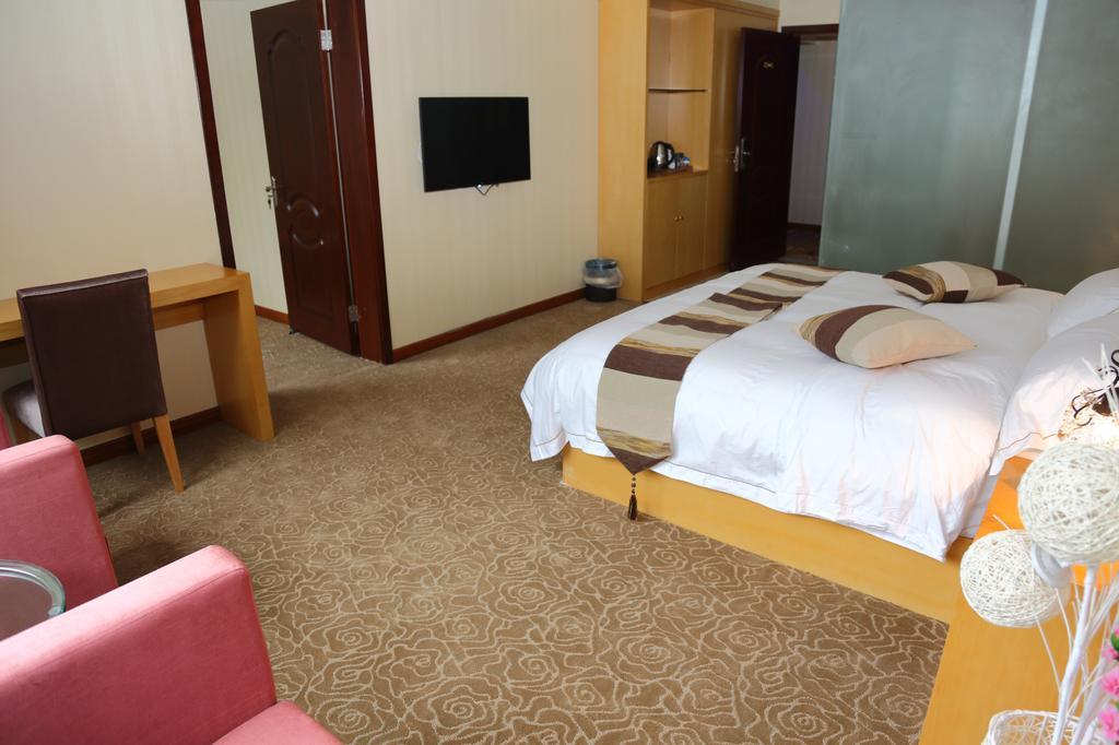 Panshan Tingquan Tuwo Holiday Resort Leshan Ruang foto