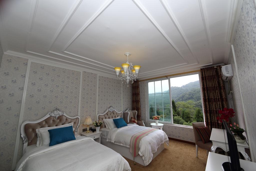 Panshan Tingquan Tuwo Holiday Resort Leshan Ruang foto