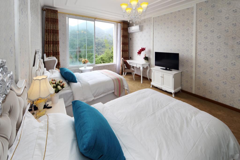 Panshan Tingquan Tuwo Holiday Resort Leshan Ruang foto