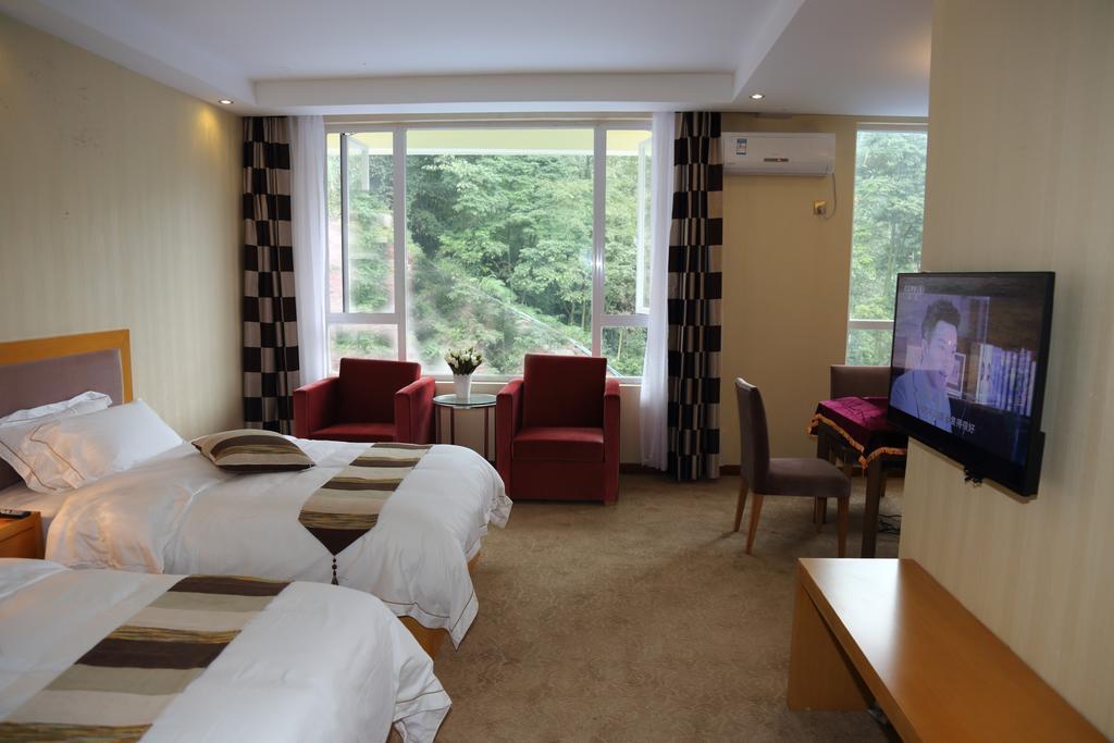 Panshan Tingquan Tuwo Holiday Resort Leshan Ruang foto