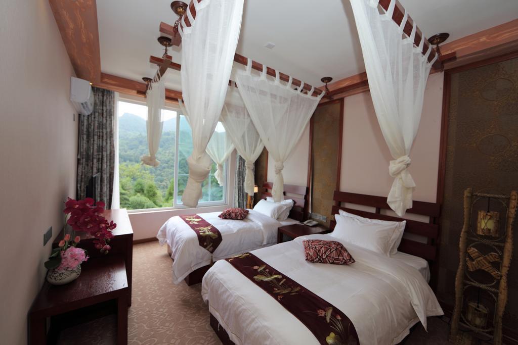 Panshan Tingquan Tuwo Holiday Resort Leshan Ruang foto