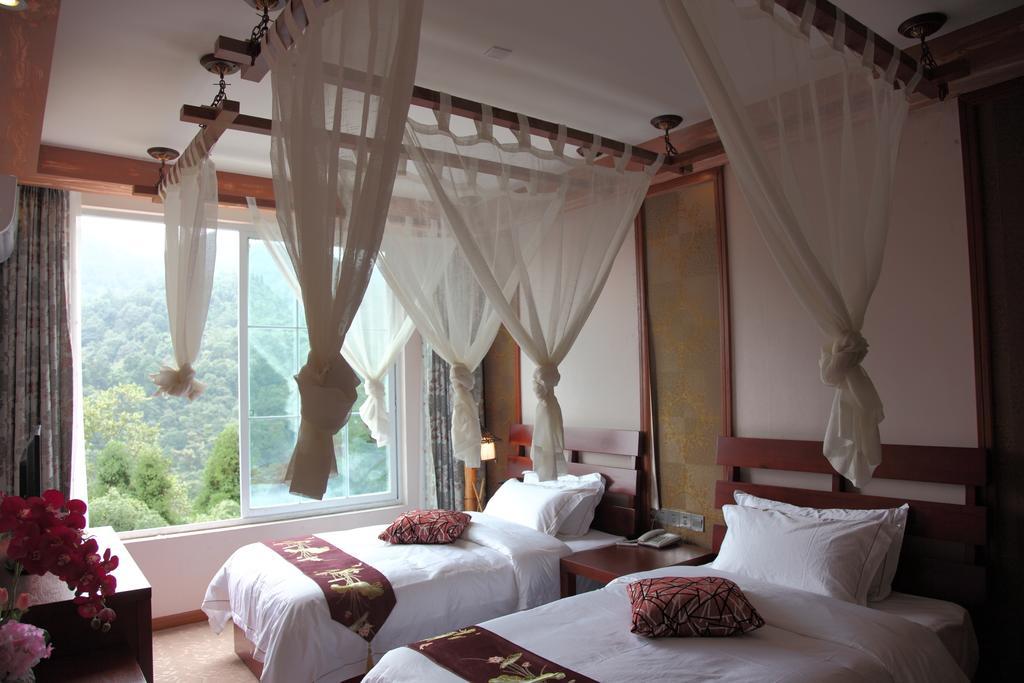 Panshan Tingquan Tuwo Holiday Resort Leshan Ruang foto