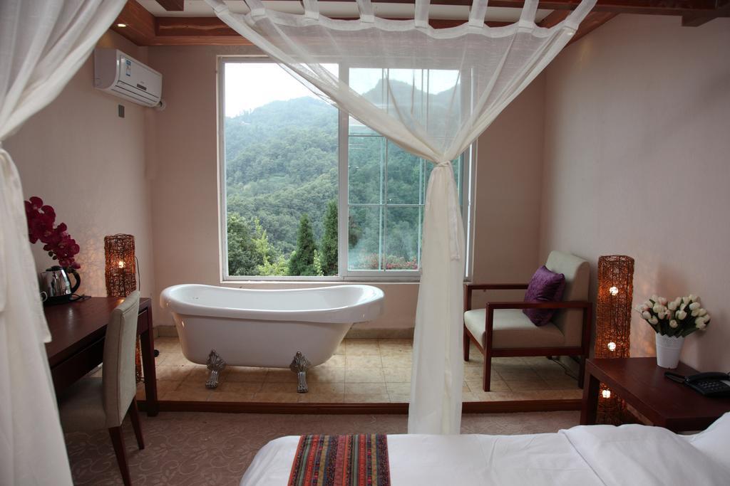 Panshan Tingquan Tuwo Holiday Resort Leshan Ruang foto